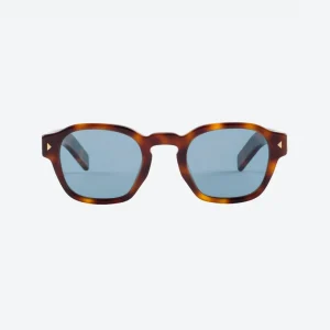 tortoiseshell sunglasses with the iconic metal plaque