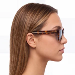 tortoiseshell sunglasses with the iconic metal plaque